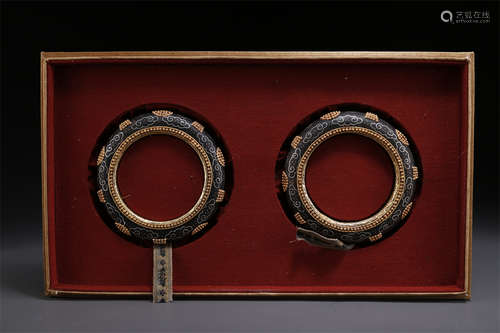 A Pair of Agarwood Bangles.