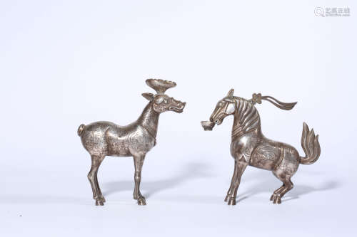 A Pair of Silver Mythical Beasts