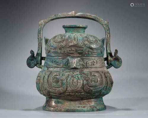 A Chinese Bronze Wine Vessel You Shang Dyn.