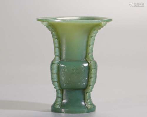 A Chinese Carved Spinach Green Jade Beaker Vase Qing