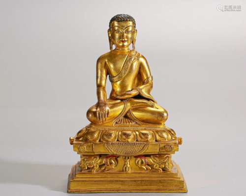 A Tibetan Bronze-gilt Seated Guru