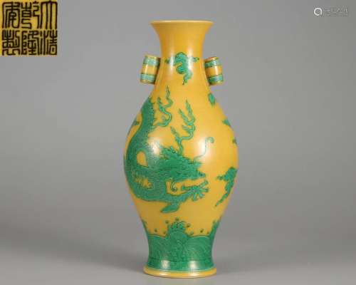 A Chinese Yellow Ground and Green Enameled Vase Qing