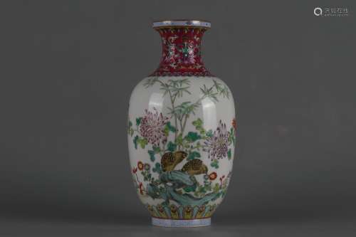 Enamel painted gold vase with flower and bird