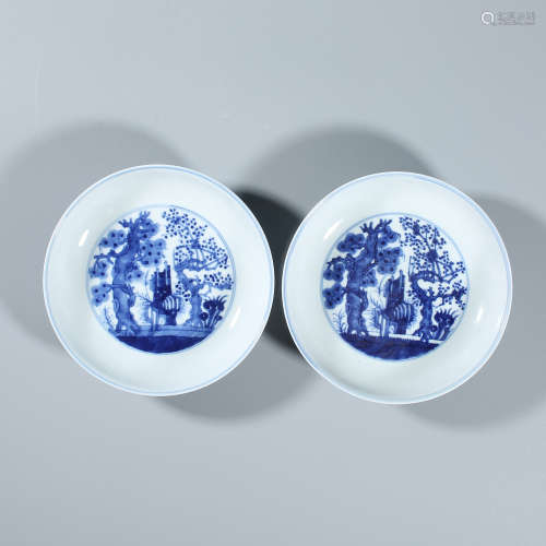 A pair of blue and white plates