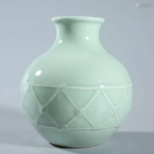 Green glazed bottle