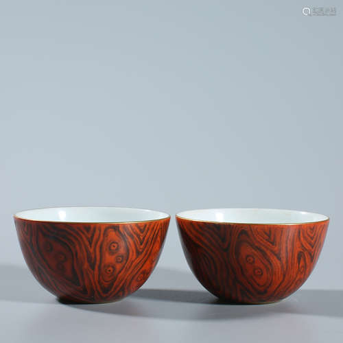 A pair of imitation wood grain glazed cups