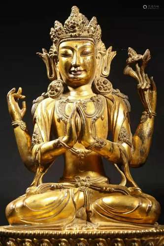 Qing: A Gilt Bronze Four-armed Guanyin Statue