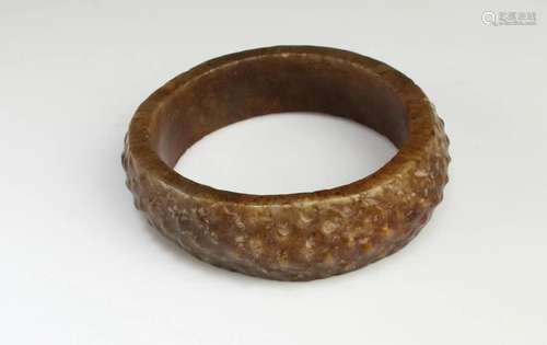 A Carved Jade Bangle