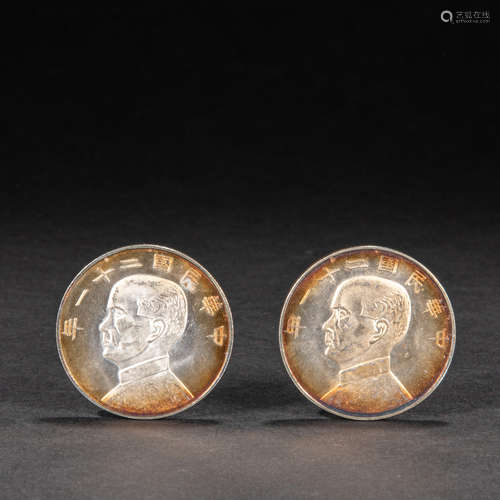 A PAIR OF CHINESE SILVER COINS