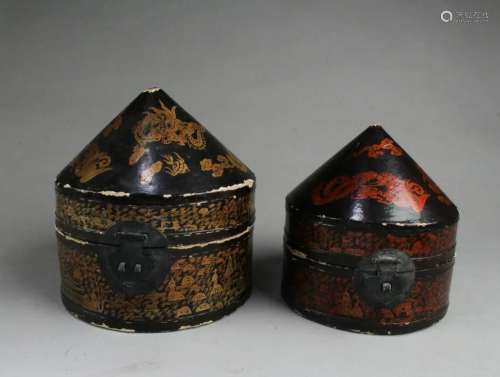 A Group of Two Leather Wrapped Cone Shaped Boxes