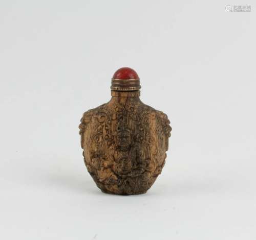 A Carved Wooden Snuff Bottle