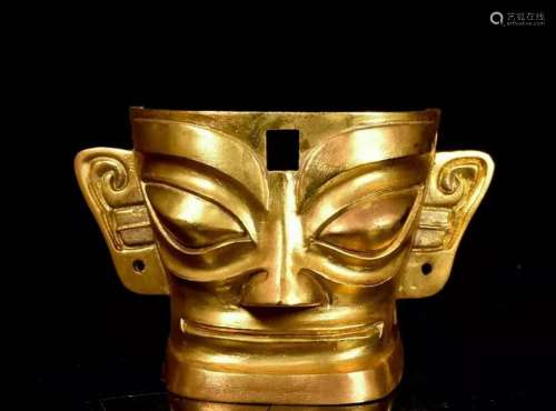 A Gilt Bronze Face Mask