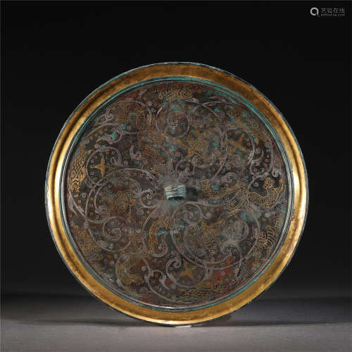 A GILT BRONZE MIRROR WITH GLOD AND SILVER PAINTED