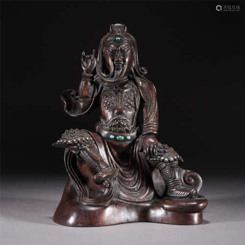 A CHINESE CARVED CHENXIANG GUANGONG SEATED STATUE