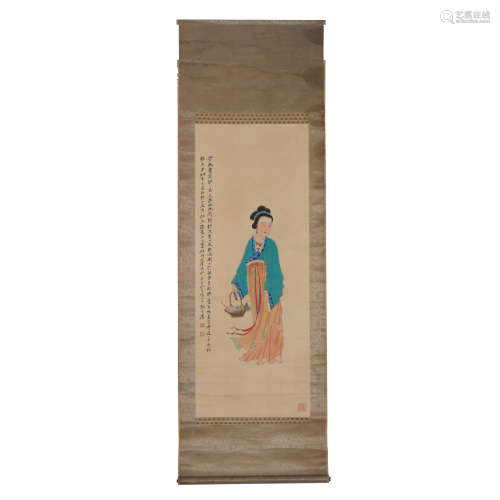 A CHINESE SCROLL PAINTING OF TRADITIONA WOMAN