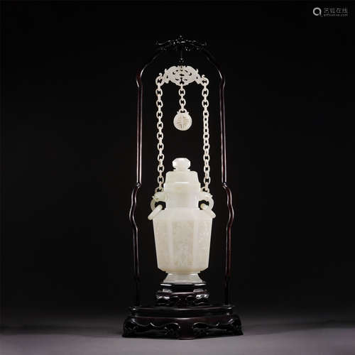 A WHITE JADE HEXAGONAL VIEWS VASE CARVED PINE AND CRANE