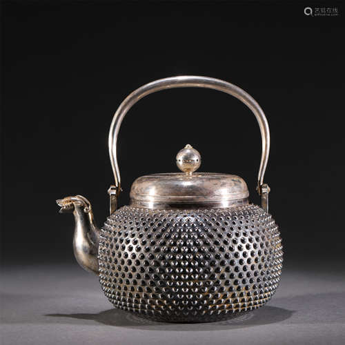 A SILVER KETTLE