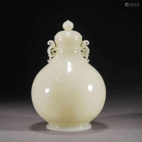 A WHITE JADE CARVED FLOWERS ROUND BOTTLE