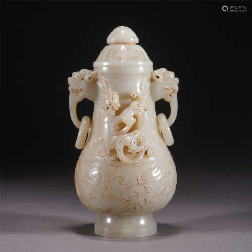 A JADE CARVED DRAGON PATTERN LIDDED VASE