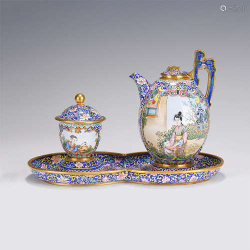 A GROUP OF PAINTED ENAMEL TEAPOT AND TEACUP