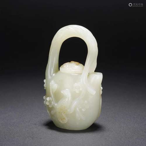 A CHINESE WHITE JADE HANDLED EWER