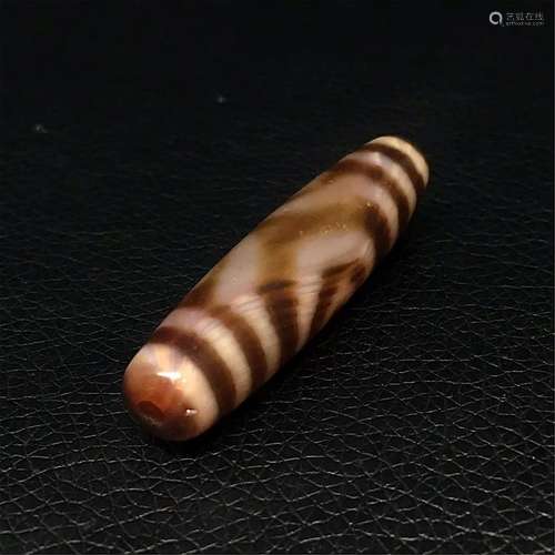 Tibetan three-eye dzi bead