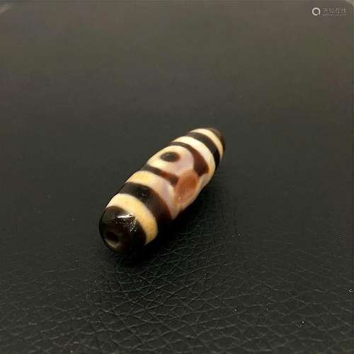 Tibetan three-eye dzi bead