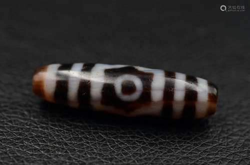 Tibetan three-eye dzi bead