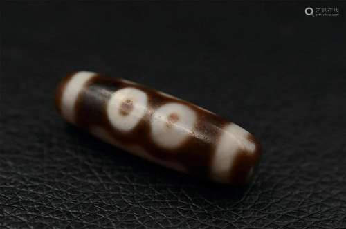 Tibetan three-eye dzi bead