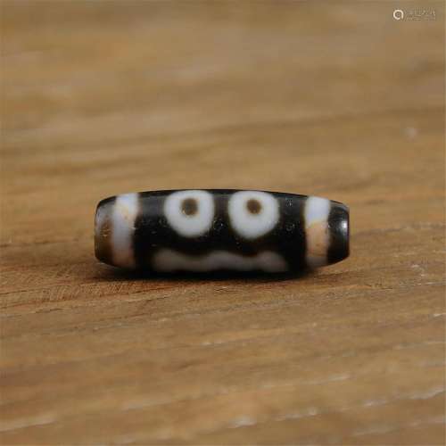 Tibetan three-eye dzi bead