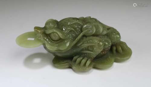 A Carved Jade Frog Figurine