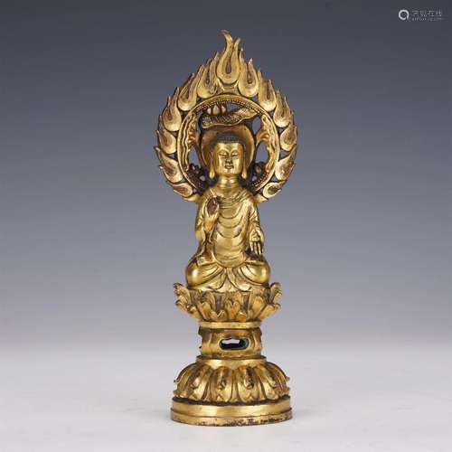 A CHINESE GILT BRONZE FIGURE OF BUDDHA SEATED STATUE