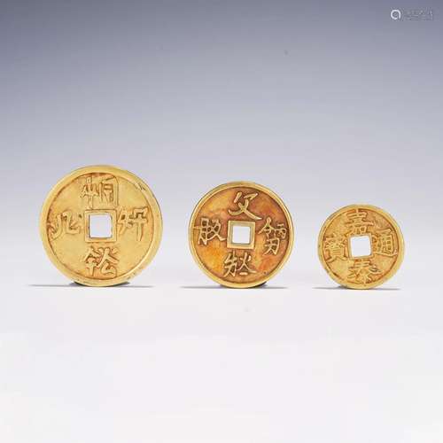 A GROUP OF CHINESE GILT SILVER COINS