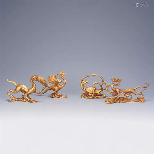 FOUR CHINESE GILT BRONZE BEAST ORNAMENTS