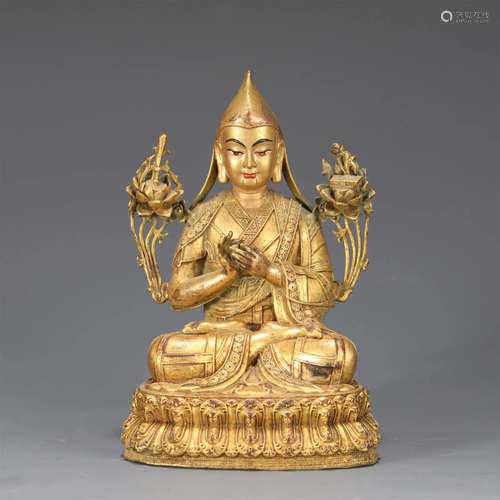 A CHINESE BRONZE FIGURE OF BUDDHA STATUE