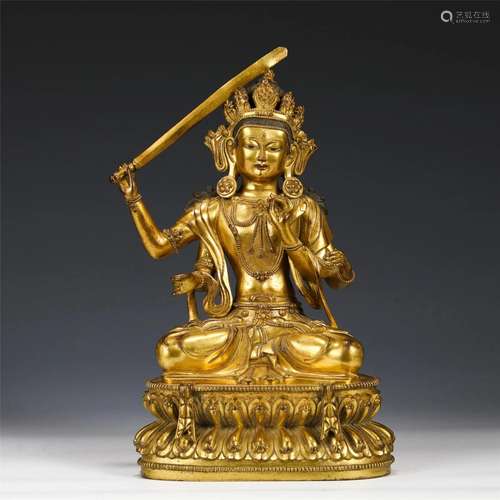 A CHINESE GILT BRONZE FIGURE OF BUDDHA STATUE