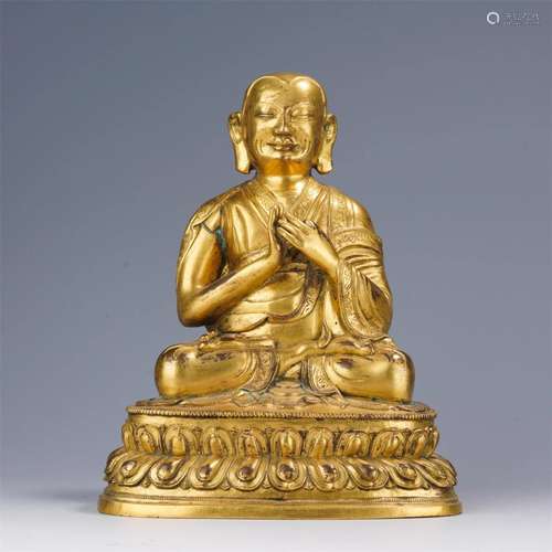 A CHINESE GILT BRONZE FIGURE OF BUDDHA SEATED STATUE