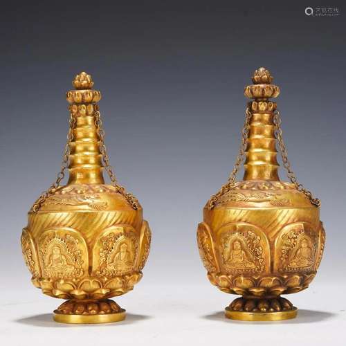 A PAIR OF CHINESE GILT BRONZE BUDDHIST TOOLS