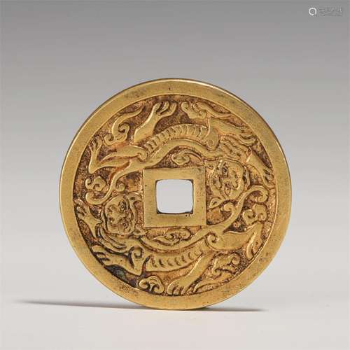 A CHINESE BRONZE COIN