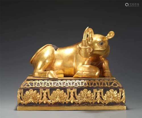 A CHINESE GILT BRONZE RHINOCEROS ORNAMENTS