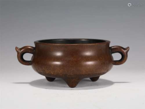 A CHINESE BRONZE TRIPOD CENSER