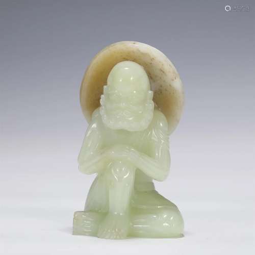 A CHINESE JADE FIGURE