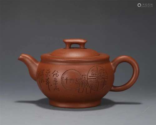 A CHINESE YIXING ZISHA CLAY TEA POT