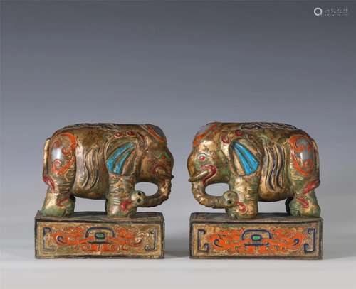 A PAIR OF CHINESE GILT BRONZE ELEPHANTS