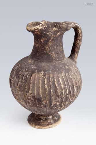 Etruscan Oinochoe, 3rd century BC. Black ceramic. Measures: ...