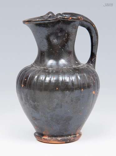 Etruscan Oinochoe, 6th century BC. Black glazed ceramic or b...