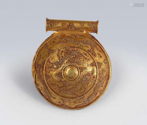 Etruscan bulla, 5th century BC. In yellow gold. Measures: 2,...