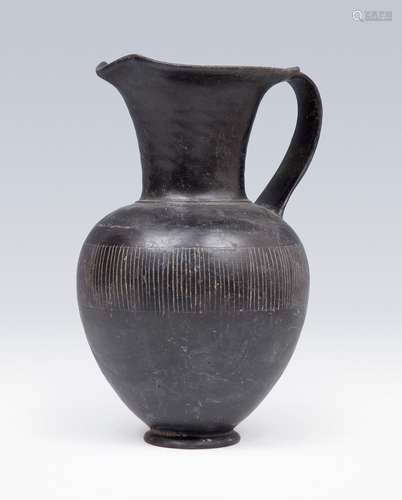 Etruscan Oinochoe, 6th century BC. Black glazed ceramic or b...