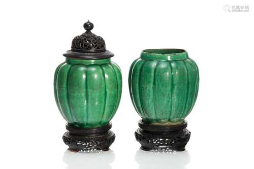 PAIR OF CHINESE GREEN GLAZED COVERED JARS ON STAND