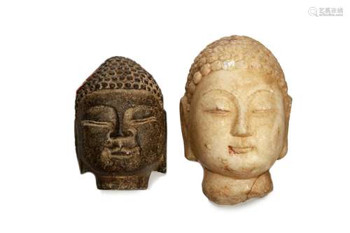 TWO CHINESE STONE HEADS OF BUDDHA